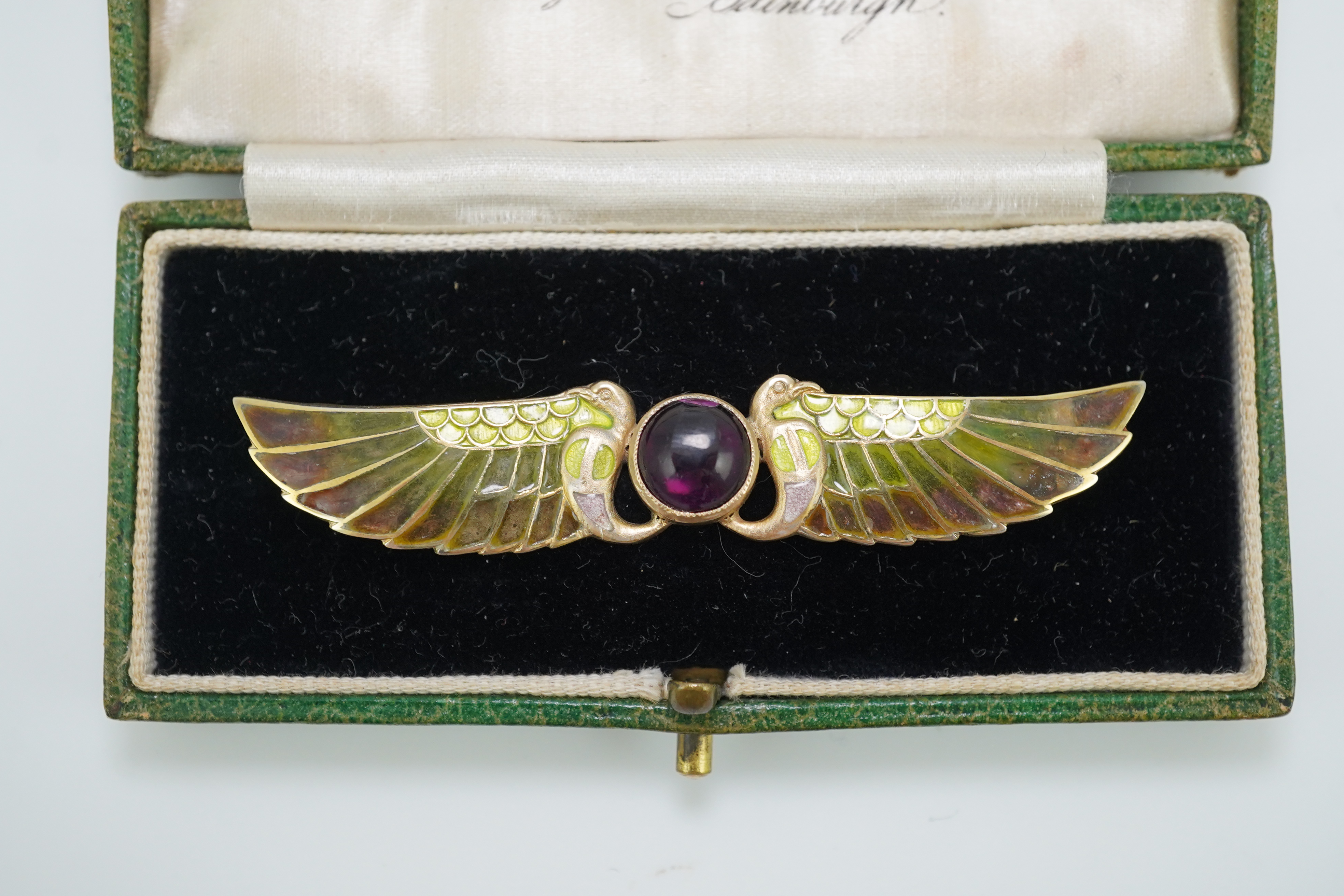 An Egyptian Revival tourmaline and enamel brooch, circa 1900